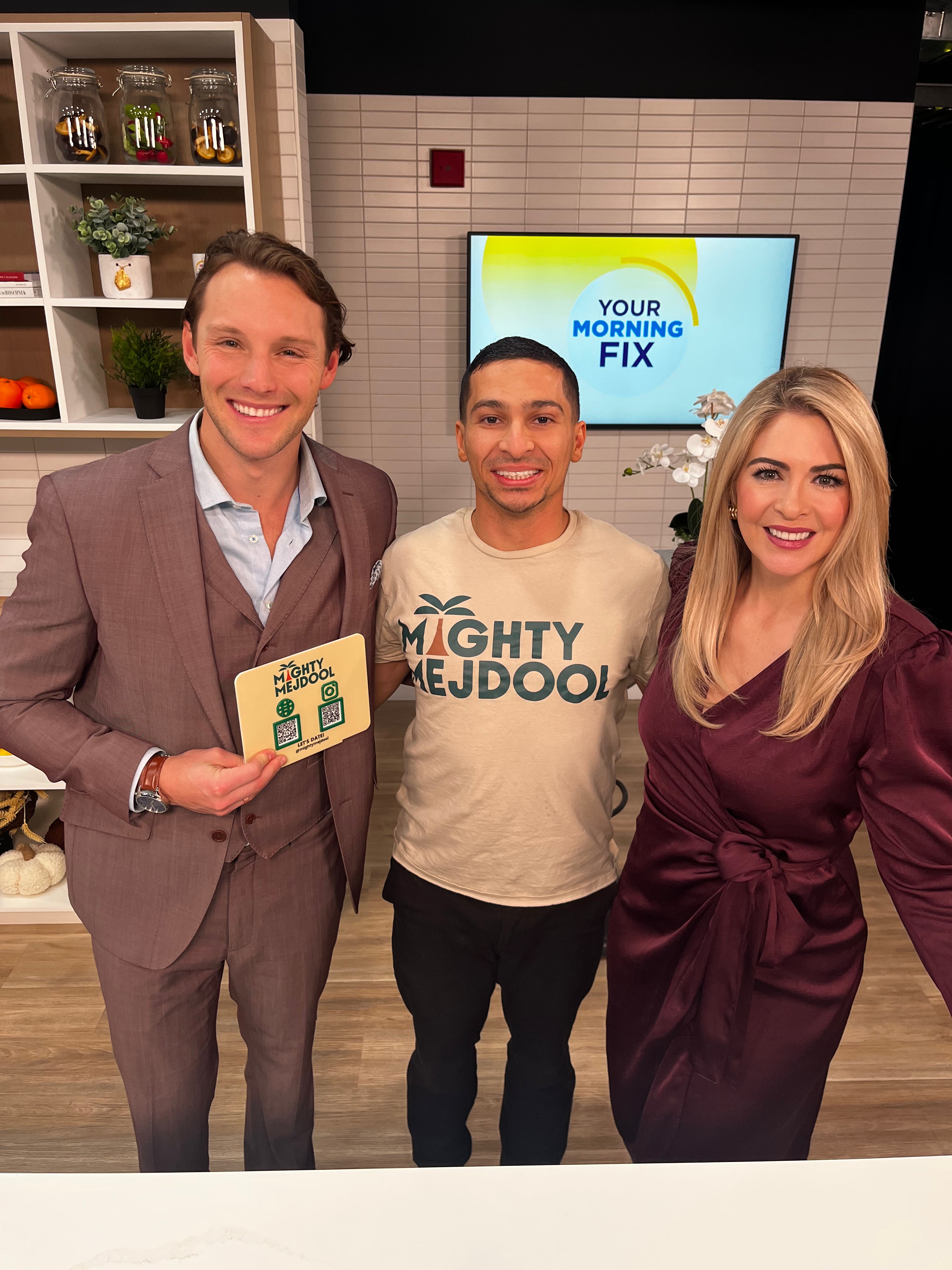 Mighty Mejdool on the CTV Your Morning Ottawa set, posing with the hosts in the studio