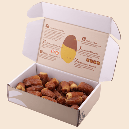 Open 454 g Mighty Mejdool Sagai dates box showing golden-brown two-tone dates and printed nutrition benefits inside the lid.