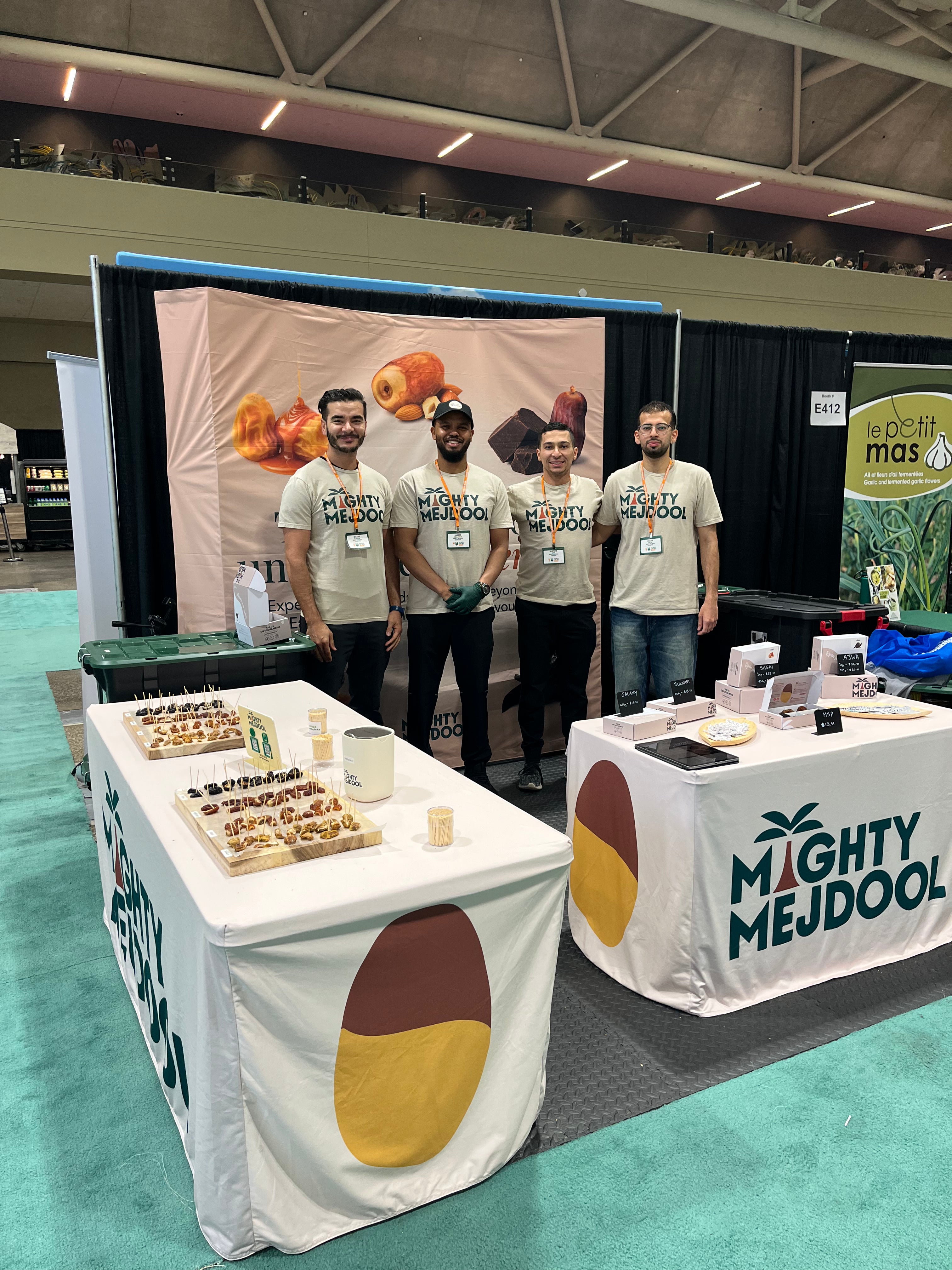 Mighty Mejdool team at their first Eat Well Live Well Expo booth at the Metro Toronto Convention Centre, sampling premium dates.